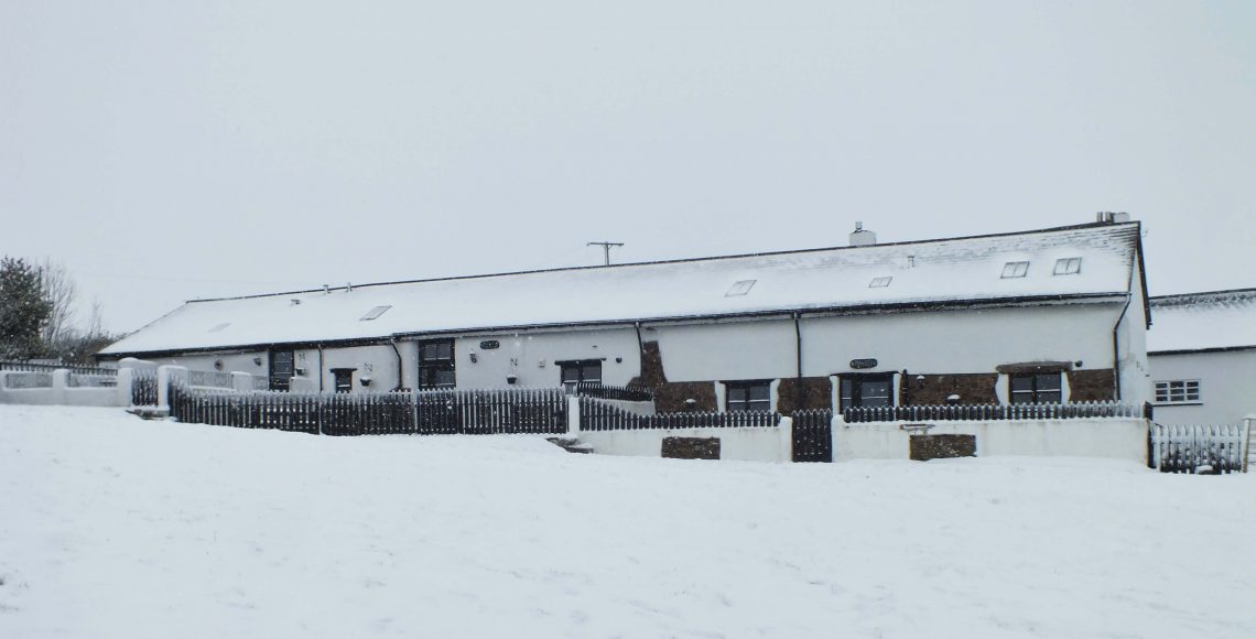 Woodland Cottages in the snow