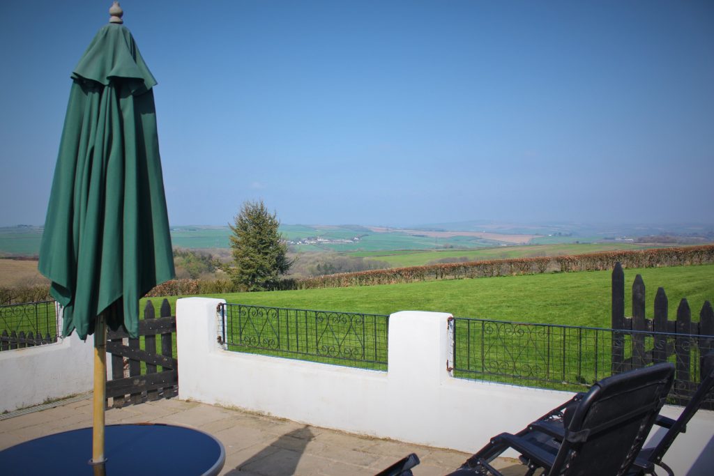 Owl cottage patio, dog paddock and countryside views